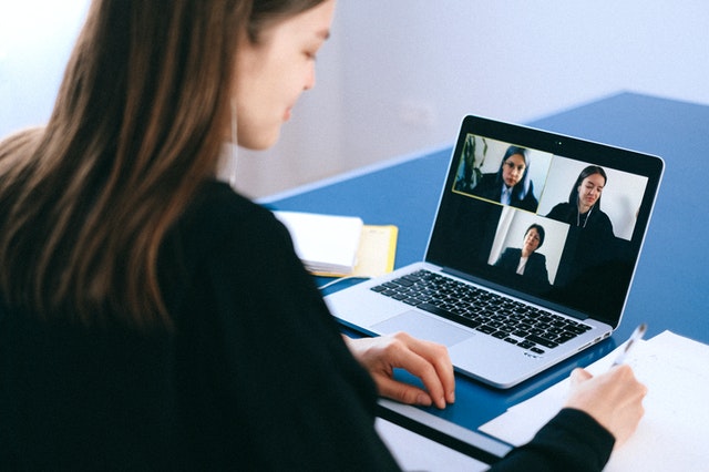 Woman leading virtual meeting