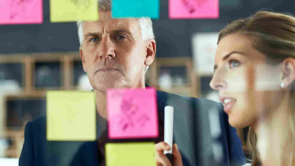 People engaged in a strategic visioning workshop