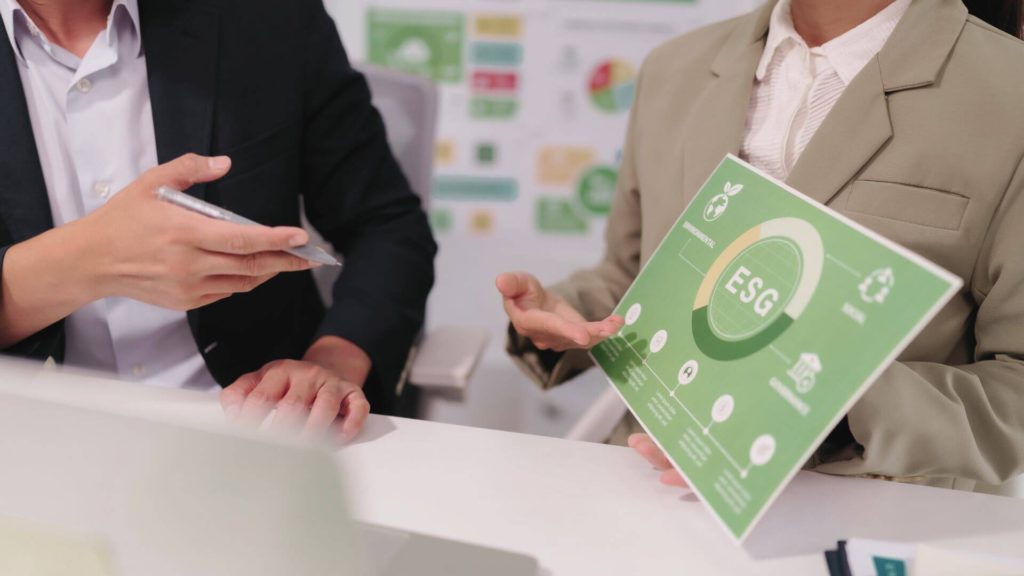 People discussing ESG in a sustainability workshop
