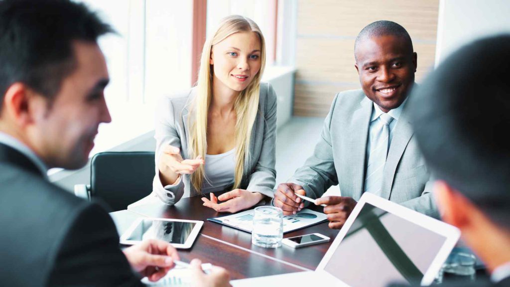 Smiling people in business meeting
